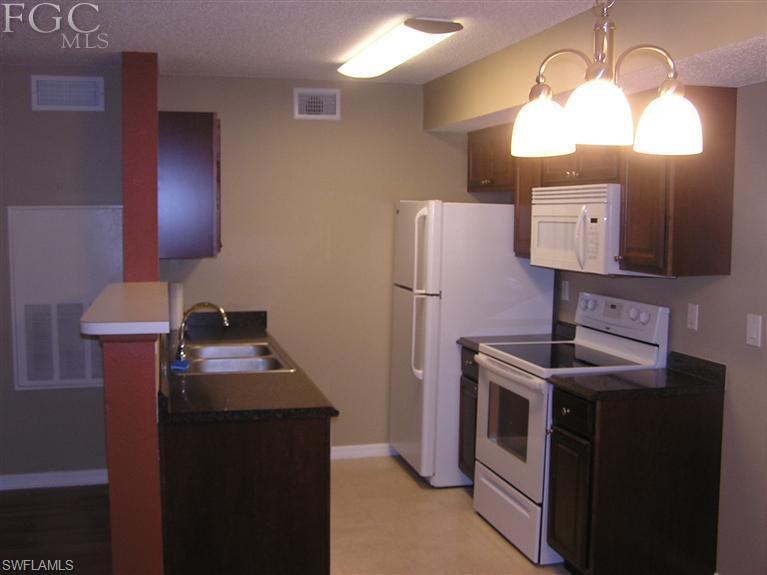 BEAUTIFULLY REFURBISHED 1ST FLOOR CONDO IN OUTSTANDING SOUTH FT MYERS LOCATION. THIS CONDO OFFERS , NEWER APPLIANCES, UNIT IS CLOSE TO THE COMMUNITY POOL, WATER IS INCLUDED IN THE HOA FEES. COMMUNITY OFFERS COMMUNITY POOL, PICNIC AREA, GYM. 
THIS WOULD BE AN EXCELLENT CHOICE FOR YOUR SEASONAL HOME OR FOR YOUR FIRST HOME.
Hardwood has been replaced with carpet in living room and master bedroom.