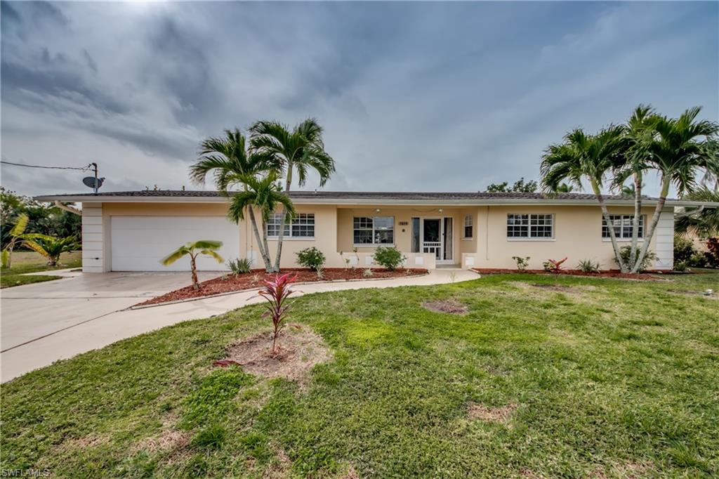 Boater's Dreams are made of this! DIRECT SAILBOAT GULF ACCESS, just one minute to the river!! There are two boat lifts which truly sets this home apart from the rest in the area. This gulf access home with a heated pool has the highly desirable southern exposure that everyone is looking for. Sun in the pool area year round! The house is located within a 15 minute walk to the Yacht Club and Cape Coral beach. The bridge to Fort Myers is less than 5 minutes away via car. 3 bedrooms, 2 bathrooms, and 2 car garage. This house features an open kitchen and living room which is perfect for entertaining! Granite counter tops and stainless steel appliances make the kitchen feel modern. The house has tile and laminate flooring throughout. The pool is electrically heated making it usable year round, especially with the amazing southern exposure! Dual boat lifts!! ALL ASSESSMENTS PAID! Make an offer today, before it's gone!!