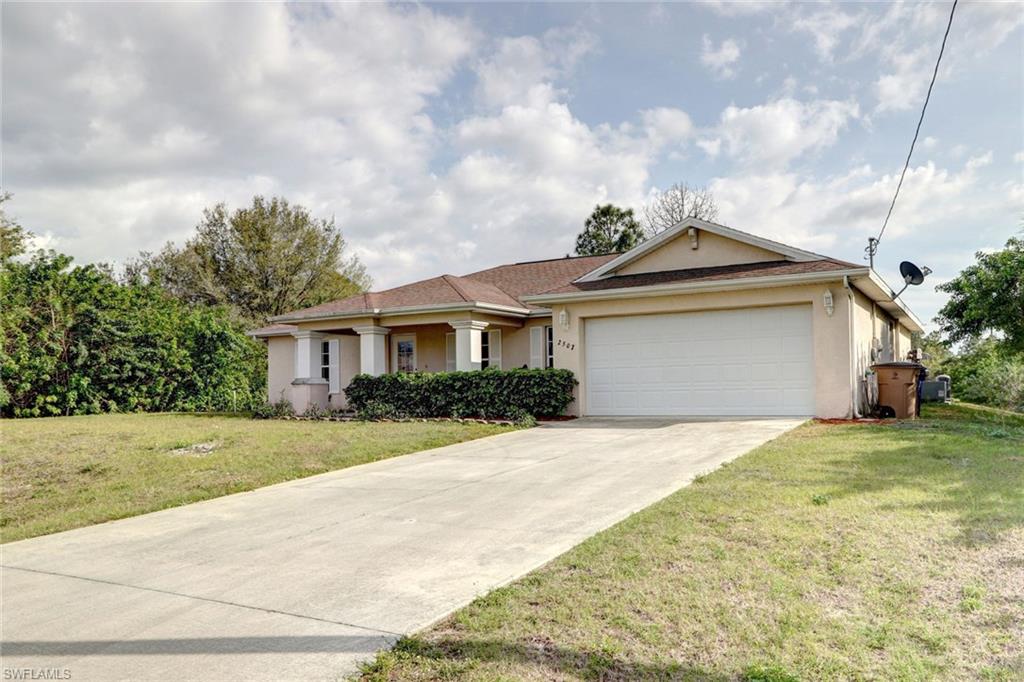 BRING YOUR FHA (property is seasoned for 90 days) VA, CONVENTIONAL OR CASH BUYER Don't miss this completely renovated home with over 1777 sq ft of open living area in a nice private serene setting.This beautifully remodeled 3/2 sits on a quiet street right off of Sunshine in a great neighborhood of Lehigh Acres. Enter through the front entrance into the cozy living area that has a beautiful wood laminate flooring with tile in the kitchen. Great for entertaining guests. The kitchen features plenty of cabinet space with sizable counter tops, and a window that overlooks the lanai and large backyard with room for a pool. The whole home is freshly painted in neutral color, giving this home an even more open feeling. Step out back and enjoy a private wooded- area, perfect for cookouts and get-togethers. Don't miss out on getting to call this beautiful re-done house, "home". Call your agent today for your showing!!!