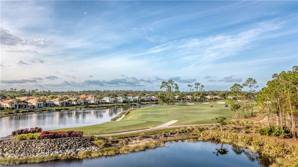 Incredible value & arguably the most outstanding view in Vanderbilt Country Club --- panoramic lake views & the 12th fairway are yours to enjoy w/out interruption! This impeccably maintained & tastefully designer turnkey furnished 2+den/2-bath home appreciates the best of both worlds: privacy (no cart paths here!) & breathtaking lake views.The freshly painted exterior welcomes you to this open floor plan w/gracious screen enclosed entry & over-sized tile throughout w/carpet in the master. The split plan offers privacy; the generous second bedroom is used as an office & w/grass-cloth wall coverings & bay window; the den is cozy & intimate behind a pocket door; the guest & master baths w/custom commodes. The dining & living rooms unite & the new shell-stone paver lanai & new aqua-fit pool & spa enjoy the lake as a backdrop. The kitchen w/new refrigerator, range & disposal & morning rm access the lanai's dining area via sliders. W/D, AC, H2O heater w/whole home hot circ, garage & entry doors are new, too! Master retreat is spacious w/2-walk-in, custom closets & access to the pool & spa. EVERYTHING'S INCLUDED --- GOLF CART & AUTOMOBILE, TOO! Call for an appointment & then Call it HOME!