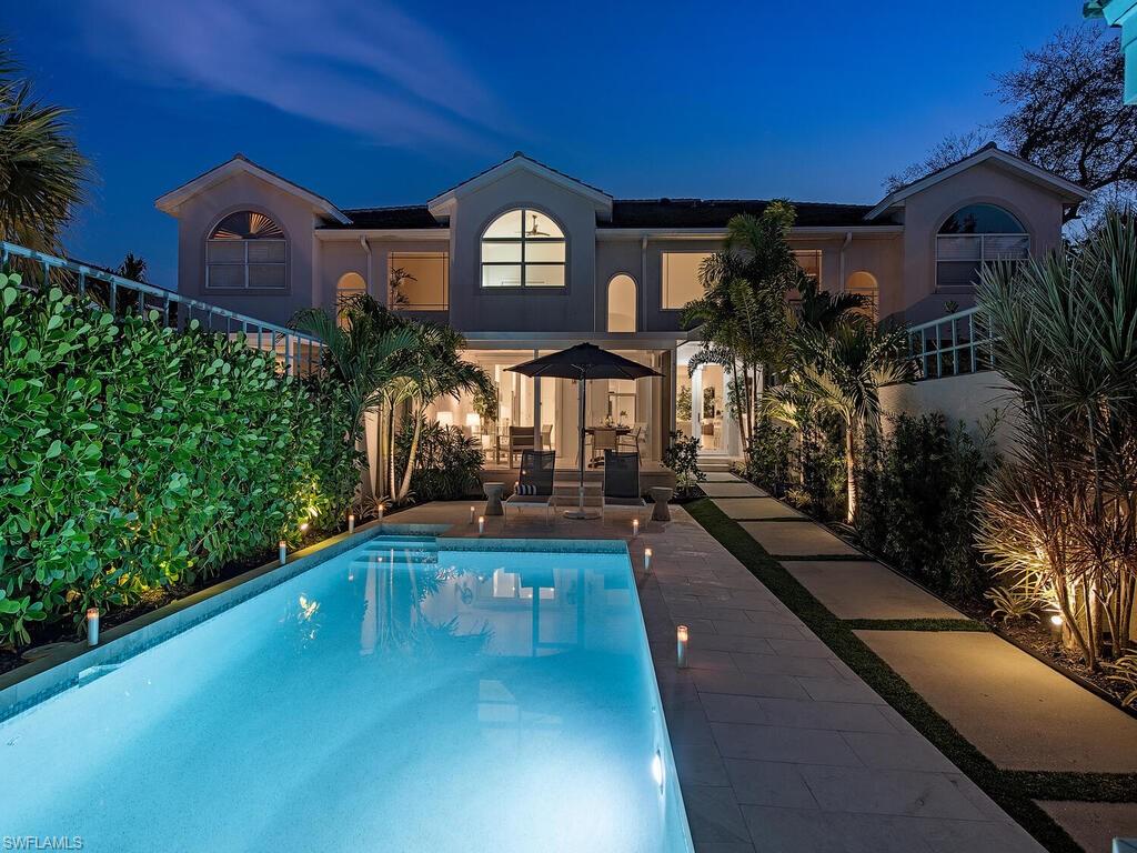 V4858 - Exceptional two-story villa exquisitely remastered with upscale finishes and fixtures.  Volume ceilings, skylights, impact- rated windows and doors, Legno Bastone oak wood floors & staircase are just of handful of the architectural details highlighting the residence.  Amazing outdoor courtyard with an incredible private pool, travertine pool deck area and a generous under-roof lanai with picture frame screening. In addition, there is a private garage accessed from the rear alley way.  Above all, the location of this very private home couldn’t be more desirable.  A short walk takes you to the white sandy beaches of the Gulf of Mexico as well as the historic district of Third Street and the shops and dining of Fifth Avenue South.  Truly a treasure spot to call your own.