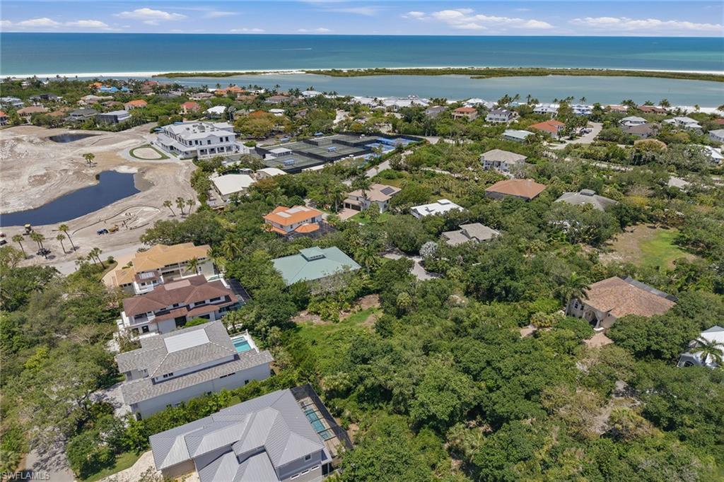 Build your dream coastal retreat on this exceptional 0.27-acre homesite in the prestigious gated community of Hideaway Beach, ideally positioned with desirable southern exposure for abundant natural light and sunny outdoor living year-round. Tucked away on a quiet street, this prime homesite offers a peaceful setting while remaining conveniently close to the community’s beach club, sports center and world-class amenities. Surrounded by lush tropical landscaping and luxury residences, this property presents a rare opportunity to create a custom home in one of Marco Island’s most exclusive beachfront communities. Whether envisioning a private island retreat or an elegant full-time residence, the location offers the perfect blend of tranquility, privacy and convenience within a beautifully maintained coastal setting. Hideaway Beach is renowned for its unmatched lifestyle and resort-style amenities set across more than 300 acres of pristine nature preserve. Residents enjoy exclusive access to over two miles of white sand beach along the Gulf, creating a true paradise for beach walks, sunsets and waterfront recreation. The community also features a nine-hole executive golf course, tennis, pickleball and bocce courts, along with a newly renovated wellness and fitness center designed to support an active and healthy lifestyle. Dining and social opportunities abound within the community, offering both casual and fine dining experiences along with a vibrant social calendar filled with events and activities throughout the year. Scenic walking and biking paths wind throughout the neighborhood, allowing residents to enjoy the natural beauty and peaceful surroundings unique to Hideaway Beach. Ideally on Marco Island, this homesite offers convenient access to the island’s shopping, dining, marinas and nearby Naples attractions while maintaining the exclusivity and serenity that make Hideaway Beach one of Southwest Florida’s sought-after luxury communities. This is an outstanding opportunity to secure a premium homesite and experience the exceptional beachfront lifestyle Hideaway Beach is known for.