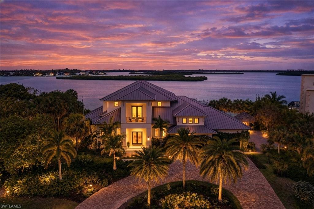 A rare offering in a prestigious exclusive peninsula enclave south of Marco Island, this $7.2M architectural statement redefines coastal luxury with uncompromising scale, privacy, and design.

Spanning an impressive 8,300 square feet, this 3-bedroom + den, 5-bathroom estate is crafted for those who demand space without sacrificing sophistication. From the moment of entry, soaring ceilings and expansive walls of glass create a dramatic first impression, capturing sweeping water views and flooding the interiors with natural light.

Every inch of the home has been curated to deliver a seamless blend of modern elegance and livable comfort. The open-concept design flows effortlessly through grand entertaining spaces, while the private den offers the perfect setting for a home office or executive retreat. Each bedroom suite is generously scaled, offering spa-like baths and a level of privacy expected in a residence of this caliber.

The outdoor living experience rivals that of a five-star resort. A sprawling lanai frames the waterfront backdrop, creating the ultimate setting for sunset entertaining, private relaxation, and year-round enjoyment of Florida’s coastal climate. Designed for both quiet moments and large gatherings, the exterior spaces elevate the concept of indoor-outdoor living.

Set along one of Marco Island’s most desirable waterways, this property delivers the lifestyle that defines true luxury—boating, privacy, and proximity to world-class beaches, fine dining, and exclusive amenities just minutes away.

For the buyer who understands that exceptional properties are not compared—they are claimed.

This is more than a residence.
This is a legacy address on Marco Island.