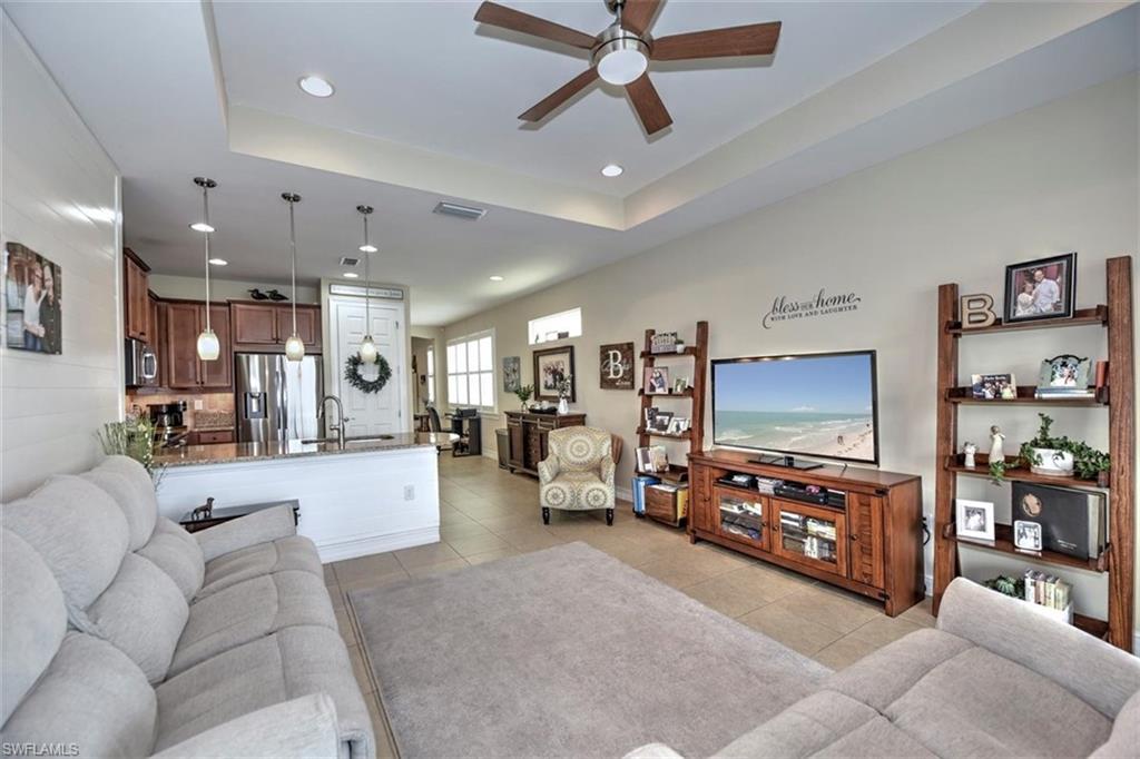 Amazing waterfront home in Community of Lindsford. This 3 bedroom, 2 bath Cedarwood floor plan has tile throughout all main living areas;  tray ceilings in entry foyer, living room and master bedroom, shiplap siding accent walls in living room, entry hallway, dining.  Plantation shutters throughout the home.  Kitchen with 42" cabinets, granite counters, stainless appliances and counter height breakfast bar for those quick meals.  Enjoy magnificent sunsets from your lanai overlooking the lake with fountain.  Garage is equipped with ceiling mounted racks for extra storage.  The view is amazing!
Large resort style pool, fitness center with children's play area, community room, tennis courts, bocce ball, child's outdoor play area.  Bike trail off community walkway which is a six mile trail for walking, biking, etc.  Lindsford is very pet friendly with the LOWEST HOA FEES in the area.  Minutes from 1-75, Historic Fort Myers River District,  Fenway South ball park, FGC University, loads of shopping and dining options within 5 minutes.  Be in your new home by fall of 2021.