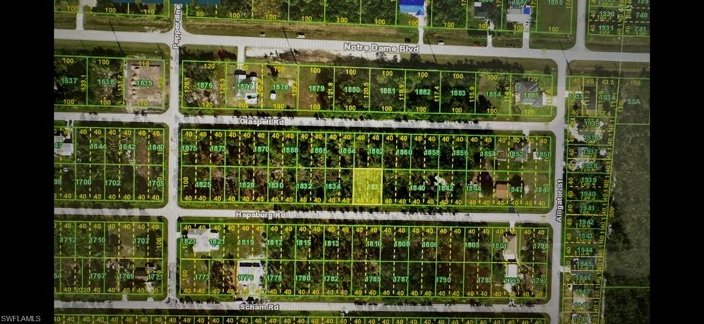 Build your dream home in Southwest Florida on this residential lot located in the growing
community of South Punta Gorda Heights. Conveniently situated near Burnt Store Road and I-75, this property offers easy access to Punta Gorda, Fort Myers, Cape Coral, shopping, dining, golf, boating, and beautiful Gulf Coast beaches. Nestled between the Charlotte Harbor Preserve and historic downtown Punta Gorda, this location combines peaceful surroundings with everyday convenience. Enjoy nearby waterfront parks, marinas, restaurants, and the charming downtown district known for its shopping, events, and scenic views along the Peace River. This lot offers an excellent opportunity for a primary residence, seasonal getaway, or investment property in an area experiencing continued growth and development. No HOA fees and plenty of potential to create your own piece of Florida paradise.