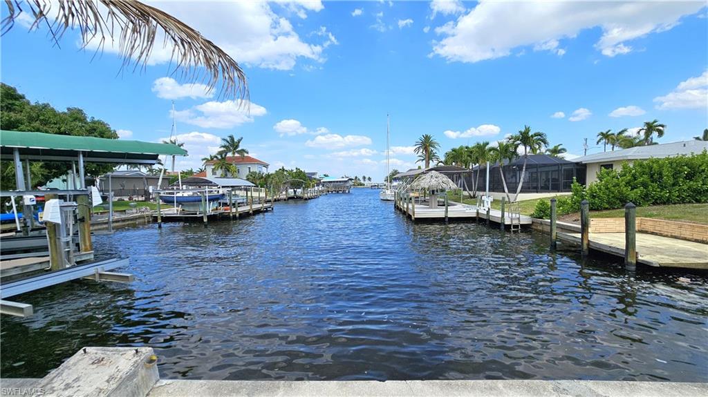 Location, Location, Location!!!
No bridges, No locks! Just a short ride out, explore the Gulf of Mexico & all the barrier islands along the Intracoastal
Waterway. Oversized corner lot with additional seawall and concrete dock, direct sailboat access and close to all the amenities Cape Coral has to offer. 
Public water and sewer are already in place, and all assessments paid! Ready to build!