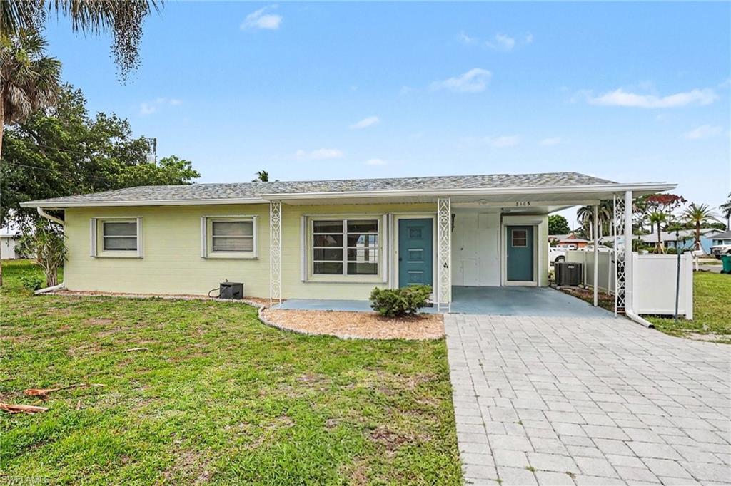 This is a super cute, cozy home with beach cottage feel! Best location ever as it is in walking distance to stores and restaurants as well as driving distance to Sanibel or Fort Myers Beach within a few minutes. Also a short drive to medical facilities and historic downtown Fort Myers.  Very bright and airy with lots of windows. Freshly painted inside and out, brand new ceramic tile through out including the enclosed lanai. Inside laundry room with washer, dryer, laundry sink and storage off of kitchen. Nice large corner lot. This is a must see!!!