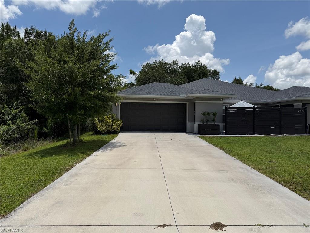 Spacious and well-maintained duplex featuring 3 bedrooms, 2 bathrooms, and a 2-car garage. This home offers tile flooring throughout, providing easy maintenance and a clean, modern look. The open kitchen flows seamlessly into the living and dining areas, creating a bright and inviting space for everyday living and entertaining. All appliances are included, including a washer and dryer for your convenience. Enjoy relaxing outdoors on the covered lanai. Conveniently located near shopping, restaurants, schools, and major roadways. Don't miss this opportunity to make this beautiful rental your next home!