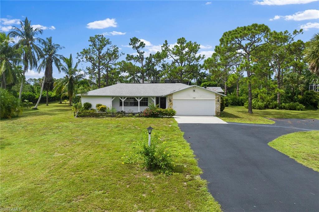 Rarely available, 1.38 “in town” acres in one of Naples’ highly sought-after neighborhoods, Pine Ridge Estates. Imagine escaping to your own private oasis where you are free to roam among the mature, tropical landscaping which includes a mango tree, two avocado trees, and palm trees to name a few. Start from scratch and build your dream home, along with a guesthouse, and enjoy the view of the lake across the street. Or renovate this 1970s classic ranch featuring four bedrooms and a den, two-and-a-half baths, pool and spa. 1,000-square-foot, open air, “detached shed,” complete with electric and small workshop area; the perfect place to park an RV or store a boat, Jet Ski and other big toys. New roofs on both in 2020. Only two miles from Vanderbilt Beach. Conveniently located to world-class shopping and dining at Waterside Shops and Mercato. Enjoy an evening at Artis—Naples, the nearby performing arts center. You can have it all! Surrounded by multimillion-dollar homes. This home presents an incredible opportunity to embrace the quintessential Naples lifestyle you deserve.