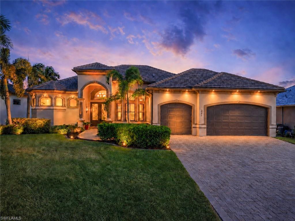 Some homes impress. Others simply make you feel at home the moment you walk through the door. This exceptional Gulf access residence seamlessly blends timeless elegance with effortless waterfront living in highly desirable Gulf access neighborhood offering quick boating access to Matlacha Pass.  Spanning over 2,500 sq ft, this beautifully appointed home offers 3 bedrooms, private office, 3 full baths, oversized 3 car garage w/mini split ac & new tile roof (2022). Every detail has been thoughtfully selected, from the soaring 12-foot coffered ceilings & extensive crown molding to the tile flooring throughout main living areas & brand-new carpet in the bedrooms.  The spacious great room flows effortlessly into the dining area & gourmet kitchen, creating the perfect setting for entertaining or everyday living. The kitchen features custom wood cabinetry, granite countertops, SS appliances, large center island & abundant workspace that will delight any home chef.  At the end of the day, retreat to the luxurious primary suite, where tray ceiling, private lanai access & spa-inspired bath create your own sanctuary. Relax in the soaking tub, refresh in the oversized walk-in shower & enjoy dual vanities & two generous W/I closets. Guests will appreciate the thoughtfully designed split-bedroom floor plan, including  private ensuite ideal for family or overnight visitors. The dedicated office provides the perfect work-from-home space.   Practical features include a spacious laundry room with abundant storage & oversized garage with new epoxy flooring & overhead storage.  Outside is where the Florida lifestyle truly shines. Set along an impressive extra-wide canal spanning approx 170 feet across, this exceptional waterfront setting offers expansive views & incredible sense of space. The screened lanai offers multiple areas to relax, entertain & dine, anchored by a fully equipped outdoor kitchen with built-in grill, sink, refrigerator & granite countertops. The custom saltwater pool, complete with electric heat and soothing fountain, invites year-round enjoyment.  The waterfront amenities continue with an expanded composite dock, a 10,000-pound boat lift & inviting tiki hut—the perfect place for morning coffee, sunset cocktails, or simply unwinding by the water. Within minutes, you'll be cruising through Matlacha Pass to world-class fishing, secluded islands, shelling adventures, waterfront restaurants, and unforgettable Gulf sunsets.

Built with both beauty & peace of mind in mind, the home features impact-resistant windows & doors, city water & sewer fully paid & low FEMA flood insurance policy. New roof 2022, new ac 2021 & more.

Ideally located near shopping, dining, the exciting Seven Islands development, and a championship golf course, this home offers not only exceptional quality but an unmatched Florida lifestyle.

If you've been searching for a home where elegant design meets the freedom of waterfront living, your search ends here.