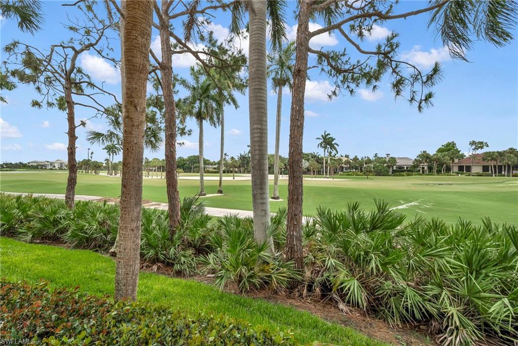 Spectacular fairway and lake views across the 14th and 15th holes of Bonita Bay's Bay Island course.  Offered furnished with two bedrooms plus den, 2.5 baths, tile floors in the living areas and carpet in bedrooms. Fortified by electric storm shutters on all windows and the main entry, the garage had water intrusion during hurricane Ian but the living area did not have water intrusion.  Enjoy the unparalleled lifestyle of Bonita Bay, including access to a private marina and exclusive beach park. Residents also have the opportunity to experience the renowned Bonita Bay Club, offering world-class amenities such as championship golf, tennis, pickleball, fine dining, a state-of-the-art fitness center, and full-service spa.