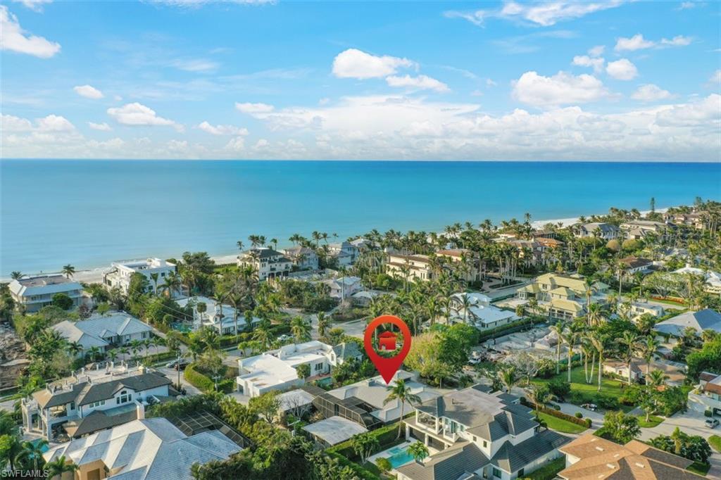 Ideally located just 1 block (4 houses) from the Gulf of Mexico on one of Olde Naples gorgeous tree-lined streets, this property offers a fantastic opportunity to build and or remodel the current home that is there. Southern rear exposure with alley access. Home has sustained damage to the structure/ home, being sold for Lot Value. Great lot size being - 100 X 150, .34 acres. Most of the current home has already been ripped out to the studs. This property is located in one of Naples prestigious & highly desired locations also being just blocks away from historic Third Street South, 5th Avenue Downtown, fine dining, shops & down the street from the future Four Seasons Beach Resort.
