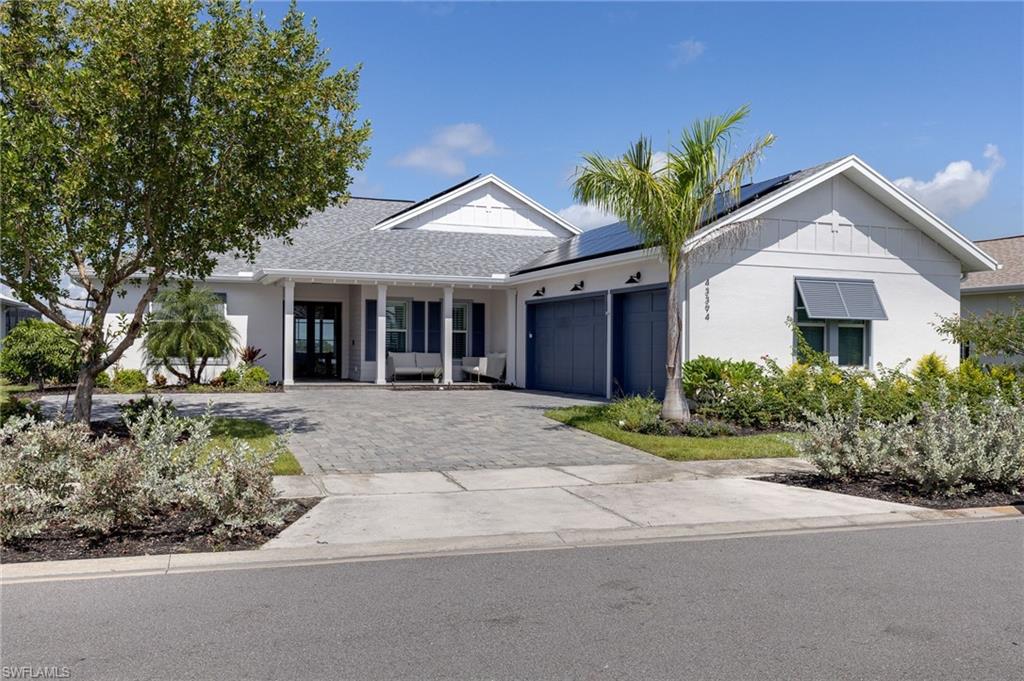 Experience refined waterfront living in this exceptional Stock Custom Home located in the prestigious Lake Babcock Estates, one of Babcock Ranch's most desirable neighborhoods. Perfectly situated on a premium lakefront homesite, this extensively upgraded residence offers spectacular sunsets, panoramic water views, and luxury finishes throughout.

Designed to impress, the open-concept floor plan is filled with natural light through expansive impact glass doors that frame breathtaking views of Lake Babcock and create a seamless connection between indoor and outdoor living. The thoughtfully designed split-bedroom layout offers privacy for family and guests, while the spacious den provides the perfect home office or flex space.

The gourmet chef's kitchen is a true centerpiece, featuring European custom cabinetry, Taj Mahal brushed quartzite countertops, panel-ready Fisher & Paykel appliances, premium fixtures, and an oversized pantry. Throughout the home, top-quality laminate flooring provides a sophisticated, cohesive look while offering exceptional durability and easy maintenance. The elegant owner's suite is a private retreat with tranquil lake views, direct lanai access, custom walk-in closets, and a spa-inspired bathroom designed for relaxation.

Outdoor living reaches another level with a custom pool featuring a sun shelf, a new pool heater, an expansive screened lanai, and a fully equipped outdoor kitchen, creating the perfect setting for entertaining or enjoying Southwest Florida's year-round lifestyle. The beautifully landscaped backyard features artificial turf, full lake frontage, and is approved for the construction of a private recreational dock.

This home is loaded with premium upgrades, including a solar power system, a new 5-ton A/C, tankless water heater, Tesla charging station, hurricane-impact windows and doors, Hunter Douglas plantation shutters, California closets, whole-house water softener, Hunter irrigation controller, and a climate-controlled three-car garage with its own mini-split A/C.

Located in Babcock Ranch, America's first solar-powered town, residents enjoy a vibrant lifestyle with miles of scenic trails, lakes, parks, restaurants, shopping, community events, pickleball, tennis, and top-rated amenities—all within one of the nation's most innovative master-planned communities.

This move-in-ready waterfront masterpiece offers the perfect blend of luxury, comfort, energy efficiency, and breathtaking lakefront living. An exceptional opportunity to own one of the finest homes in Lake Babcock Estates.