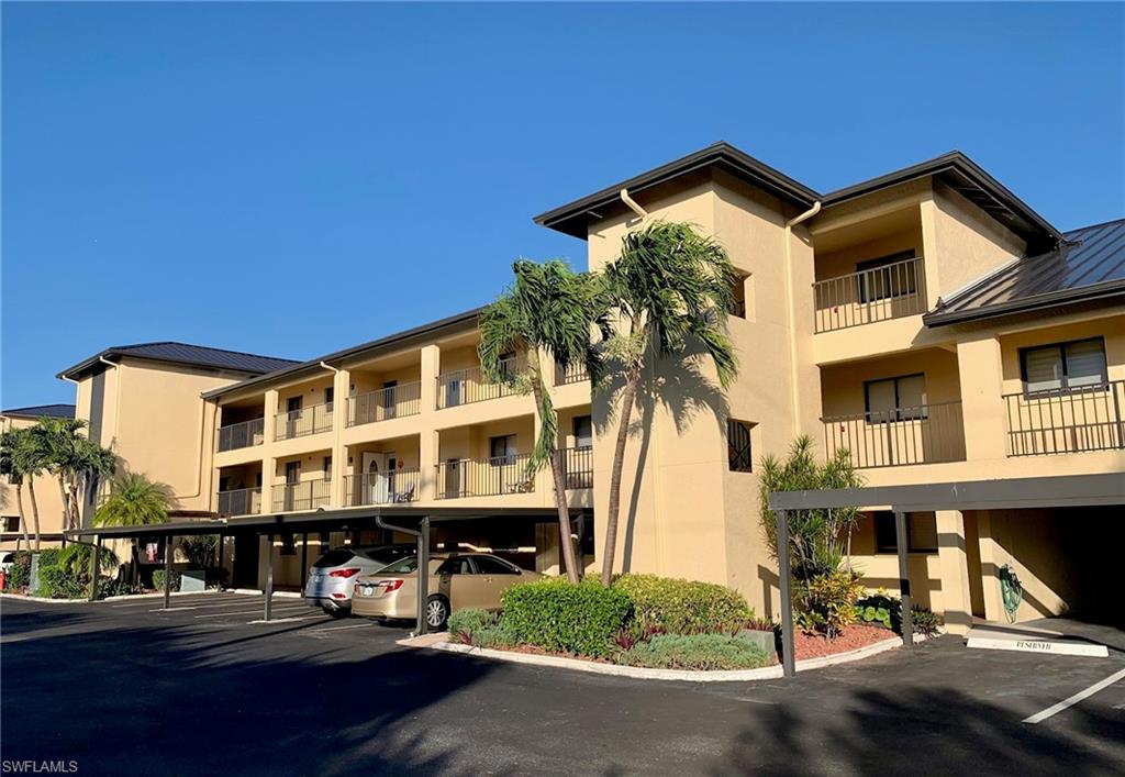 PRICE ADJUSTMENT!! Charming Top floor, 2 Bedroom 2 Bath Gulf access condo with cathedral ceilings & garage in Clipper Bay.  Amazing water & pool views from this top-floor condo consisting of a spacious eat in kitchen, pantry, & breakfast bar that opens into the large great room. Comfortable owner’s suite, including large walk-in closet, vanity with single sink, & shower. Sliding doors to lanai from both great room & owner's suite. Nicely appointed guest bedroom & guest bath w/ tub-shower combo. Inside laundry includes washer/dryer. Clipper Bay is a friendly Gulf Access Boating Community and this building is next to clubhouse, pool w/ large deck, spa, tennis/pickleball courts, BBQ grill, fishing pier and cleaning station. Owner Garage located in garage building near clubhouse. Condominium buildings have common elevators. Metal roofs new 2023. Within walking distance to dining, entertainment, shops and so much more!!! Schedule a showing today! Priced to sell!