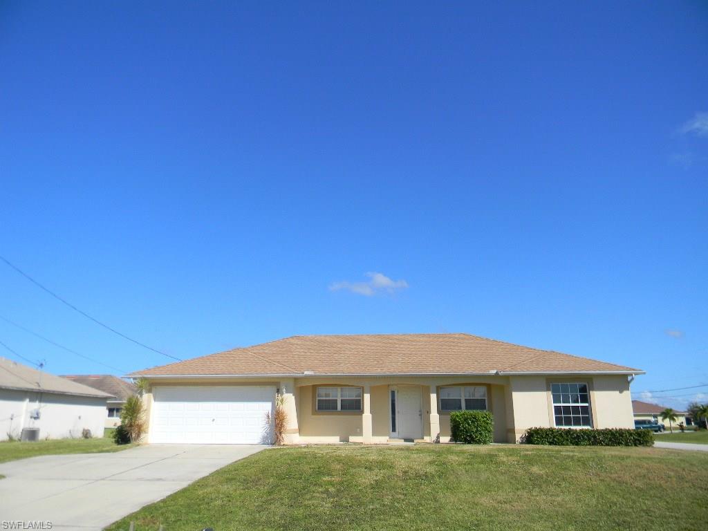 Affordable 3 bedroom, 2 bath, 2 car garage home in Cape Coral, built in 2009,corner lot off Chiquita.