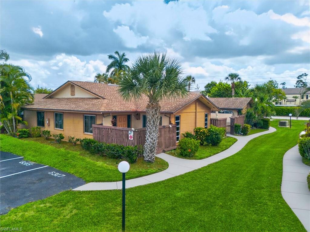 Tucked away in the desirable Royal Woods community, this beautifully remodeled villa at 6315 Royal Woods Dr offers the perfect blend of comfort, style, and easy Southwest Florida living. This move-in ready 2-bedroom, 2-bath home features an open-concept layout with soaring cathedral ceilings that make the space feel bright, airy, and surprisingly spacious. Recent upgrades throughout the home include contemporary shaker-style cabinetry, quartz countertops, updated bathrooms, modern light fixtures, and fresh neutral paint, that give the entire property a clean, contemporary feel. The kitchen flows seamlessly into the main living and dining areas, creating an inviting setup for entertaining guests or simply relaxing at home. Wood-look tile flooring runs through the entire home. Large sliding glass doors and multiple patio spaces allow plenty of natural light and create that sought-after indoor/outdoor Florida lifestyle. One of the standout features of the property is the private courtyard-style outdoor areas, perfect for morning coffee, grilling, or enjoying the warm weather year-round. The single-story villa design means no neighbors above you, adding to the quiet and comfortable atmosphere. Additional features include in-unit laundry, walk-in closets, assigned parking, and updated HVAC system and on-demand hot water. Located in the well-maintained Royal Woods community in Fort Myers, residents enjoy access to two community pools, tennis courts, shuffleboard, clubhouse amenities, and picnic areas, all with low-maintenance living in mind. The location is especially convenient — just a short drive to Sanibel Island, Fort Myers Beach, airport shopping, dining, healthcare facilities, and everyday conveniences. Overall, 6315 Royal Woods Dr offers an ideal combination of tasteful renovations, community amenities, and a prime South Fort Myers location — making it a fantastic option for looking for an affordable slice of Florida paradise.