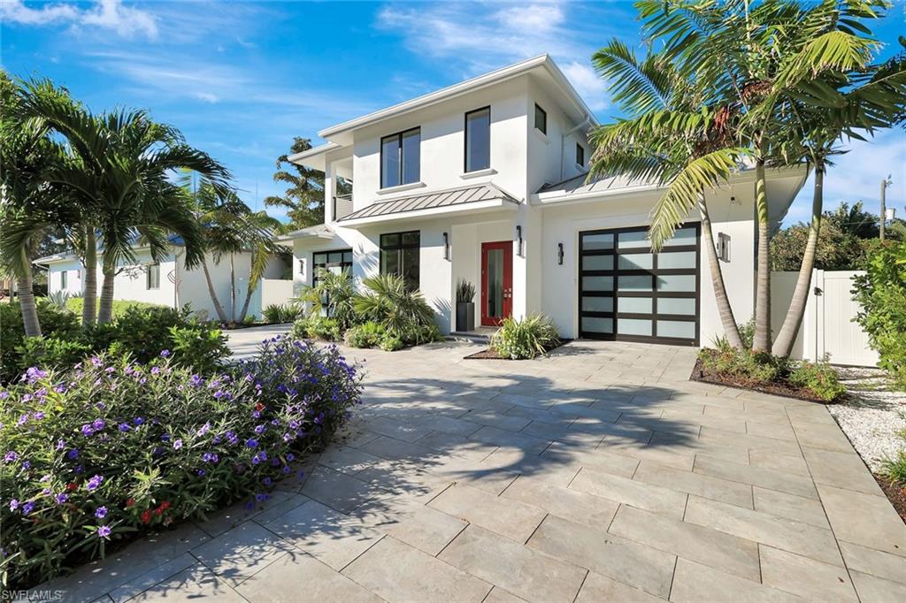 This 2022 custom-built home in Old Naples offers the perfect blend of luxury and resilience in an unbeatable location—just steps from NCH Baker Hospital, 5th Avenue South, and the beach.
Transitional cottage-style residence with nearly 5,000 sq. ft. of air-conditioned living space, featuring 5 en-suite bedrooms (including a private guest cabana), a dedicated study, gourmet kitchen, wide-plank wood floors, and a spacious fenced backyard.
Enjoy the saltwater pool and spa, covered outdoor kitchen, and fireplace—all elevated by concrete construction, natural gas, and impact glass.
A rare opportunity to own an elegant, storm-ready coastal retreat in the heart of Old Naples.