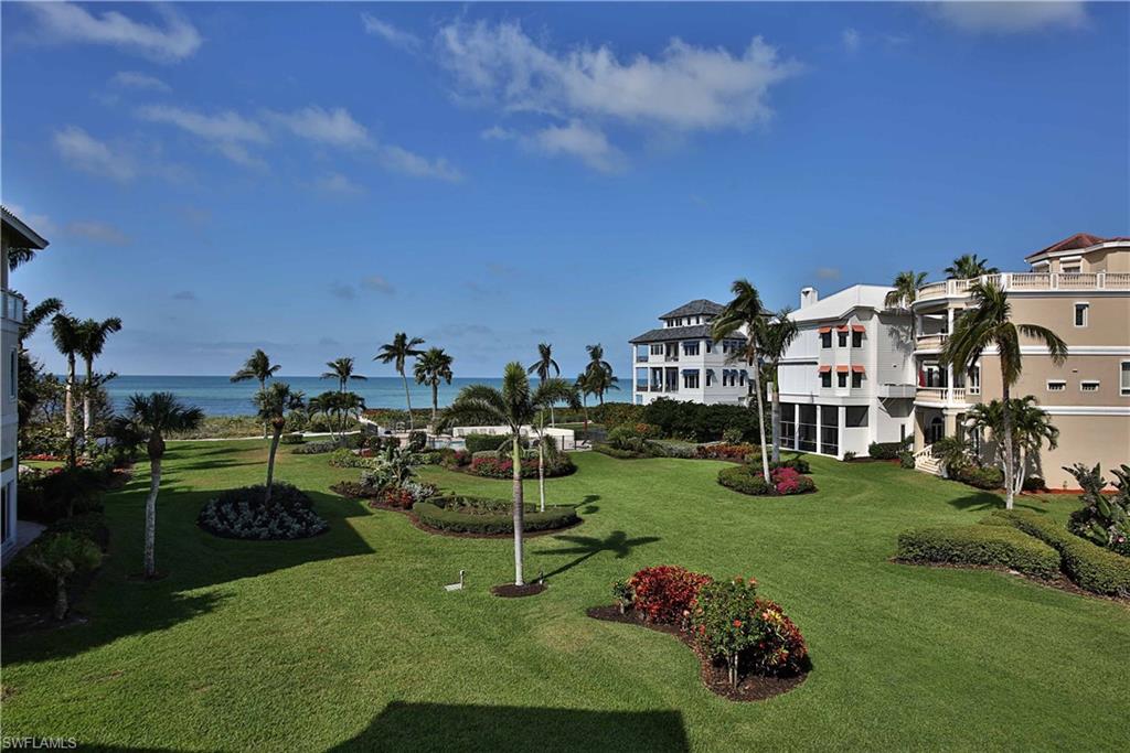 Spectacular Gulf and Sunset Views from nearly every room on one of the very few double lots in this Sprawling Estate Home. Deeded with 1 lot assement this rarely offered, all Concrete Block Home is situated directly facing the GULF overlooking one of the largest gardens in Prestigous Barefoot Beach. The panoramic Gulf View is unobstructed on all 3 floors! The home boasts a palatial rotunda with dramatic 3 story ceiling, marble floors, designer lighting fixtures and ceiling fans, newly painted with neutral palette, impact glass, newer a/c systems, fireplace, central vac, elevator, 3 car garage with spacious circular drive and water fountain. OPEN floor plan on all 3 floors provide the ultimate entertaining pleasure. Oversized balconies for the amazing Sunset experience. There is room on both the foot print and the building height for an unbelievable opportunity to expand for those looking for an Outstanding investment opportunity. Boat Dock Available. Barefoot Beach offers swimming pool, club house w/ fitness, tennis, basketball and Private Beach Access. Convenient to everything including world class shopping and dining at Mercato, Waterside, Coconut Point Mall and RSW Int’l Airport