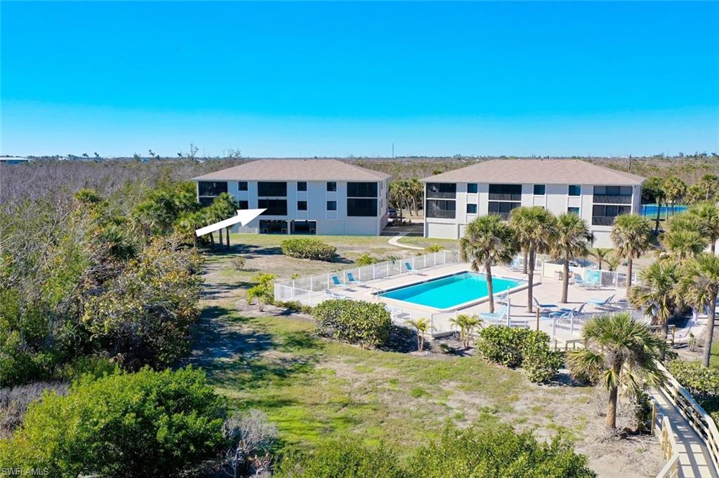 Move-in ready 2 bedroom/2 bath updated Gulf front condo at beautiful Sandpiper Beach. Very nicely remodeled condo with beautiful tile floors throughout, updated kitchen with granite countertops. Brand new impact glass windows and sliding doors. Bathrooms have tiled walk-in showers. Master bedroom has a sizeable walk-in closet. New AC unit, new hot water heater. Building has new roof. Under building designated parking and large storage locker. The complex is tucked away at the end of a dead-end street abutting a nature preserve. Heated community pool, tennis, shuffle board and grills. Gorgeous brand new boardwalk to one of the widest beaches on Sanibel. Offered fully furnished.