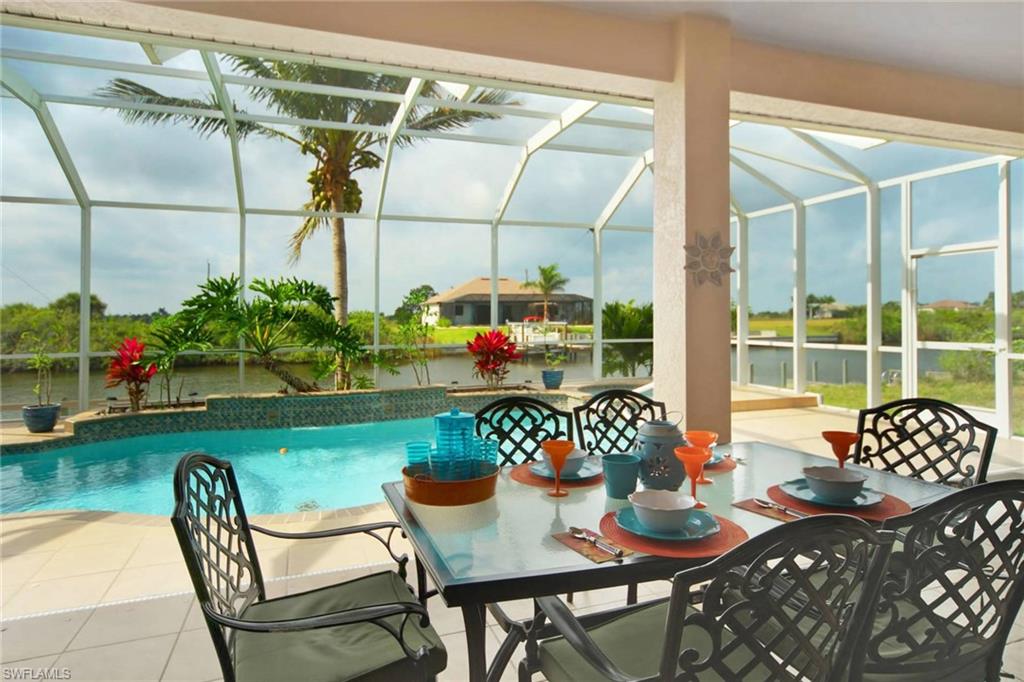 This is a VACATION RENTAL only. Owners will not consider annual rentals. Weekly rentals are welcome.

Villa Ellis is a 3-bedroom, 2.5-bathroom property on a gulf access canal with an electric-heated pool & water feature. This home sleeps a maximum of 6 guests (including children) and will accommodate up to 2 pets that do not exceed a combined weight of 35 lbs. (no cats allowed) Please inquire for possible pet exceptions.

· · · · · PROPERTY PERKS · · · · ·
- Pet friendly
- Gulf access 

· · · · · LOCATION · · · · ·
- Located in Northwest Cape Coral
- Close to Burnt Store Marina with beautiful boats & waterfront dining
- Close to Burnt Store Marina Golf Course
- Close to Boca Grande

· · · · · LIVING AREAS · · · · ·
- Flat-screen TV
- Comfortable seating
- Office with a desk

· · · · · KITCHEN & DINING · · · · ·
- Fully equipped
- Dining area with seating for 6
- Additional room for 3 at breakfast bar

· · · · · BEDROOMS · · · · ·
- Primary Bedroom: King bed, sliders to the pool & flat-screen TV
- 2 Guest Bedrooms: 1st has a Queen bed & flat-screen TV, 2nd has two Twin beds

· · · · · BATHROOMS · · · · ·
- Primary Bathroom: Soaking tub, walk-through shower & two sinks
- Guest Bathroom: Shower/tub combo
- Half-Bathroom: Pool bath

· · · · · OUTDOOR LIVING · · · · ·
- Electric heated pool & water feature (NO hot tub)
- Southern pool exposure
- Dining area with seating for 6
- Sun loungers
- Grill
- Boat dock

· · · · · THIS HOUSE IS GREAT FOR · · · · ·
Travelers looking for a quiet area of Cape Coral & access to the gulf