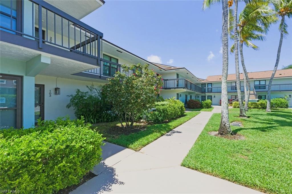 Completely renovated 2-bedroom, 2 bath condo directly across from Marco Islands famous Resident's Beach. Tile flooring throughout, wood cabinetry & quartz countertops all with a classic design that won't go out of style. Light tones to fit anyone's decor choices. Impact glass sliding glass doors. Completely furnished turnkey & ready for move in. This condo faces the courtyard and is just steps from the community pool. Beautiful flowering hedges are between the condo & pool for added privacy.