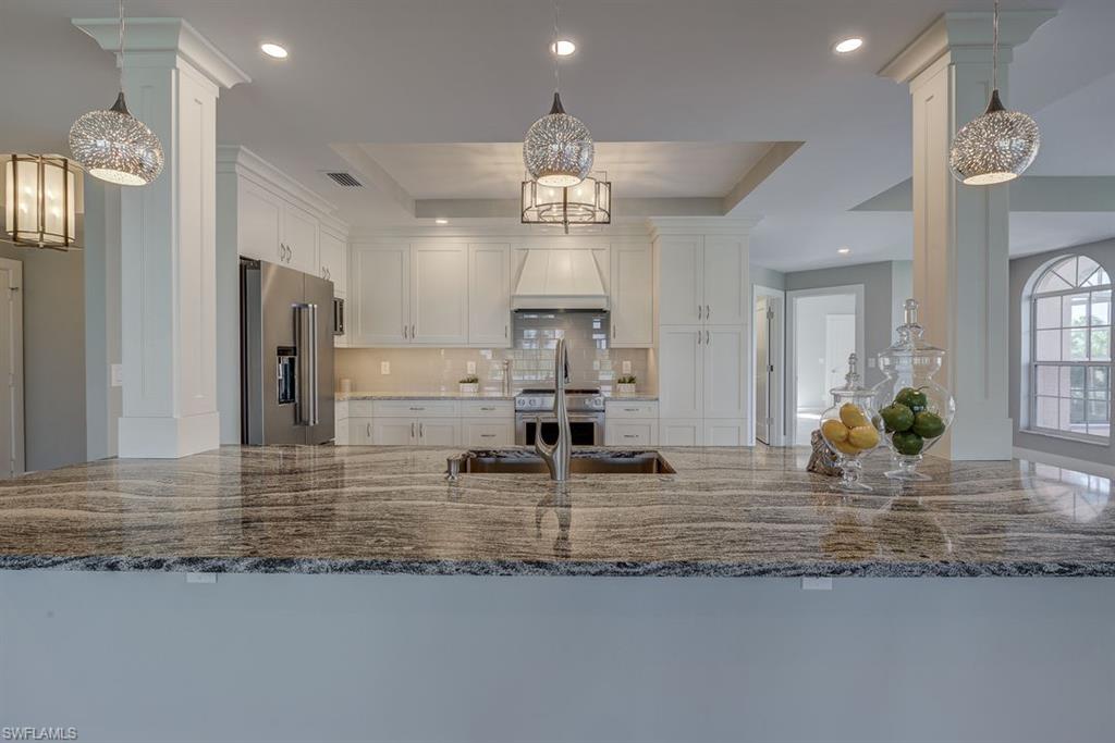Welcome to Audubon! West of 41 and in one of Naples Premiere communities, this 3 bed 3.5 bath condo provides a magnificent lifestyle with the club, tennis, pool and golf readily available for your enjoyment. This Montclair low rise condo is COMPLETELY REMODELED and fabulous! From clean lines, open concept, on trend light fixtures, built-in cabinet,  porcelain planked flooring, stunning granite and stainless steel appliances,  this residence has a major "wow" factor. Plenty of living and dining space, open wet bar and wine storage for ease while entertaining.  Light, bright and contemporary offering all the benefits of condo living and yet, the comfort of being in your own home. Over 2500 sq feet of living space along with outside lanai areas offers a delightful spot to entertain or just relax and enjoy the views. Within close proximity to the beaches, restaurants and shopping so loved in Naples, this location has much to offer. Outside space and views coupled with the inside open, renovated and modern entertaining space make this condo a very special find.

***CLICK ON THE VIRTUAL TOUR LINK AND SELECT VIDEO, YOU WILL LOVE WHAT YOU SEE***