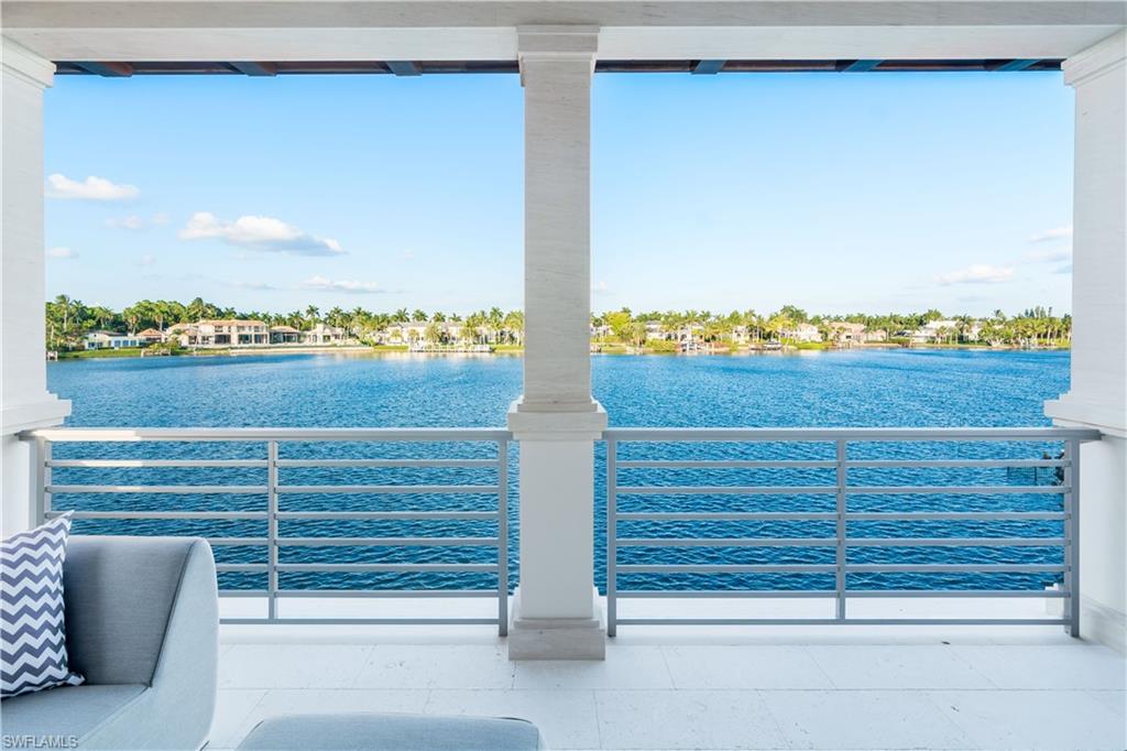 The King's Treasure. Transcendent paradise on the finest street in Naples' finest waterfront community of Port Royal. Befitting its royal name, 2525 Treasure sits atop 150' of breathtaking waterfrontage overlooking Treasure Cove while positioned steps to the sugar sand beaches and world class Port Royal Club. The finest artisans were assembled to deliver this Dutch West Indies masterpiece. Meticulously designed by John Cooney, this timeless estate has been brought to life by the most legendary of builders, A. Vernon Allen. The open floor plan with soaring ceilings consists of 5 bedrooms, 8 bathrooms and mesmerizing views. The Lisa Kahn Design Group has crowned this estate with classic Legno Bastone wide plank floors, a chef's style kitchen with Wolf and Sub Zero, custom built cabinetry, marble and stone tile work, and a custom wine cellar.  The outdoor living and kitchen showcases an oversized infinity pool and spa that merge with Treasure Cove, ideal for entertaining or just relaxing. A poured concrete second floor, whole home generator, and prestigious finishes make this luxurious property one of Port Royal's finest homes. Port Royal membership eligibility. Completion May 2017.