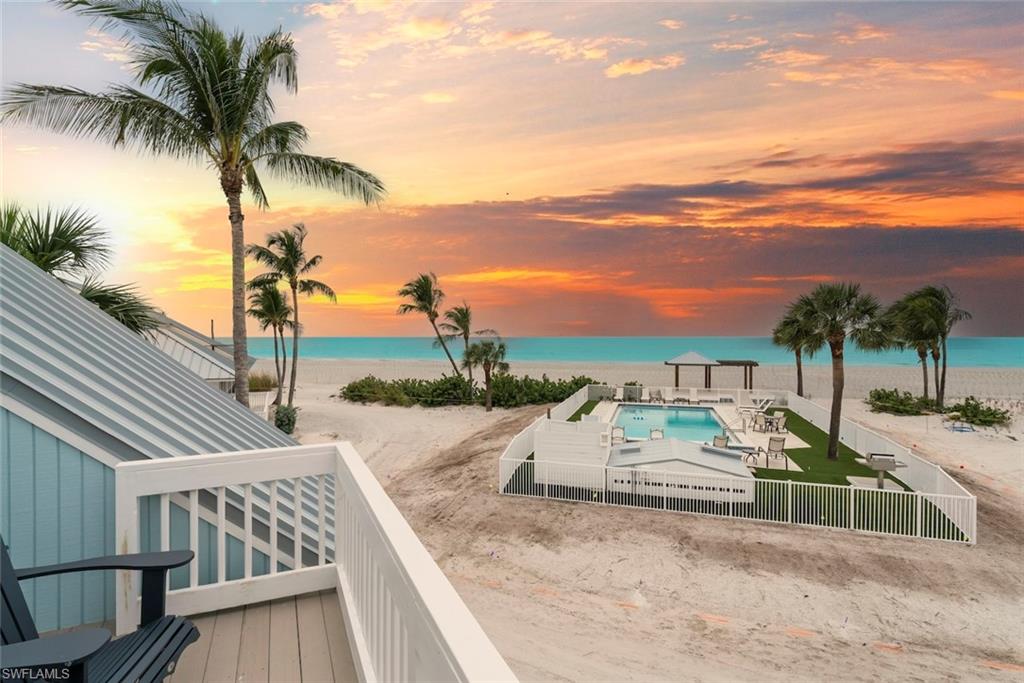 Located within an intimate enclave of Captiva Beach Homes, Beach Home 6  delivers the ultimate Captiva lifestyle.  This private Beach Home offers direct beachfront positioning, timeless island design, and the serenity only true waterfront living provides. Designed for relaxed island living and effortless entertaining, the home captures the essence of a true beachfront escape whether enjoyed as a private sanctuary or luxury investment opportunity. Enjoy morning walks on the beach and unforgettable sunset from your private coastal retreat. Experience island living with condo convenience and the privacy of a single family home. Spacious 3 bedroom w/loft and 3 baths features soaring ceilings with spacious outdoor living areas. Resort style community pool, tennis and pickelball compliment the island lifestyle. This beachfront retreat offers the largest floor plan of the Beach Homes with additional expansion options. A rare beachfront opportunity and perfect location for a second home while offering a proven short term vacation rental investment. Upgrades include new standing metal roof, flooring and impact glass.  The community shares three resort style pool along with tennis and pickleball. Rentals options and amenity information available. Fresh tropical landscaping is currently being installed and near completion.
