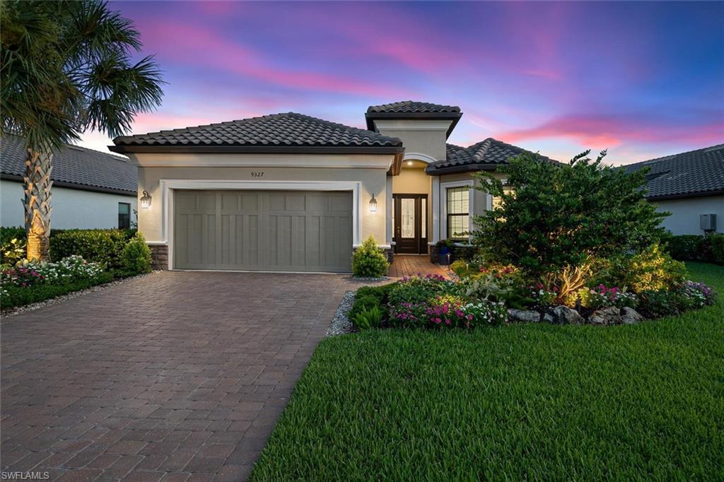 Exceptional residence represents one of the most beautifully updated homes within Esplanade Golf and Country Club. Showcasing a sophisticated redesign, the home has benefited from thoughtful enhancements, creating an elegant living environment. Upon entering, you are welcomed by light-toned hardwood flooring, fresh paint, crown moulding, soaring 10-foot ceilings, and custom plantation shutters adding timeless character. The gourmet kitchen has been reimagined with stunning light-colored stone countertops, upgraded appliances, and a built-in wine cooler, offering both style and functionality. The luxurious primary bath and guest baths feature new frameless glass shower enclosures and upgraded hardware, while Lutron-controlled art lighting highlights the home's design elements. Four new large-screen televisions, including those in the lanai and guest suites, are included. Outdoors, the covered lanai is a private retreat with a custom summer kitchen, fireplace, storm screens, and southwest-facing water views. Additional highlights include an oversized garage with custom cabinetry, epoxy flooring, and newly installed air-conditioned. Move-in ready and offered with golf membership eligibility, this Taylor Morrison built residence enjoys very reasonable utility costs and home insurance,
exemplifying the very best of Esplanade living.