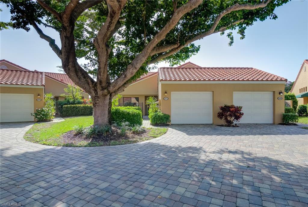 ***WOW!*** WHAT A GREAT VIEW!  One of the MOST DESIRED LAKEFRONT villa locations on the "gold coast" in BEACHWALK. Facing SOUTHWEST, the villa is LIGHT, BRIGHT & CHEERY. The villa has been lovingly maintained by the current owners for over 20 years, and now needs new owners who will enjoy the benefits and amenities offered at Beachwalk. The lanai has been glassed to add more living space in the living room and
take advantage of the view of the lake. Large tiles on the diagonal cover all floor surfaces throughout the villa,
NO CARPETING. BEACHWALK is a low density, walled, man gated community, 24/7, 365 days a year. There are SIX (6) lite professional Har Tru tennis courts; TWO (2) community swimming pools; hot spa; bocce court; secure walking gate to Vanderbilt Beach; herb garden; and scheduled activities at the club house. Walking distance to Pavilion Shopping Center, theaters, the Mercato, public library, Publix, urgent care center and several popular restaurants. It does not get any better than this.