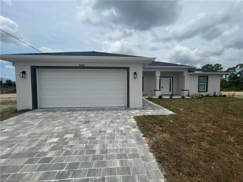 $1000 OFF THE FIRST MONTHS RENT: Available Now!! Brand New Construction 4/3
Brand-new construction in Cape Coral offers a contemporary 4-bedroom, 3-bath home with clean tile floors throughout and modern stainless steel appliances. Never lived in, this residence features two walk-in showers plus a third full bathroom, and convenient inside laundry with washer/dryer hookup. Large glass sliders and living spaces overlook a fresh water canal, providing pleasant water views from the property. Small pet maybe considered with non refundable pet fee.