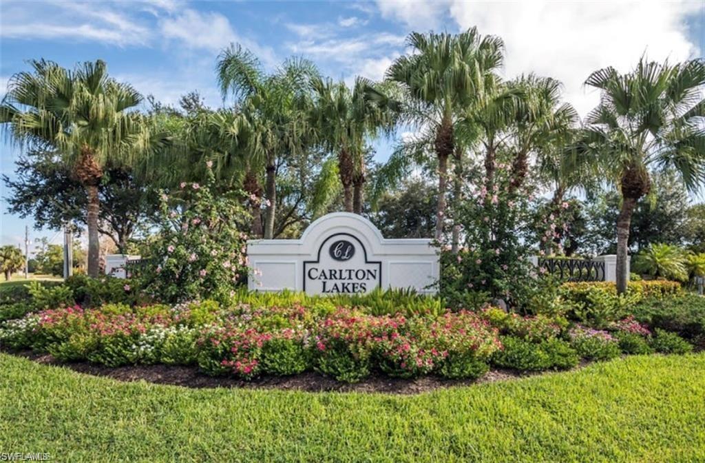PRICED TO SELL !!! This stunning south facing 3-bedroom, 2-bath end-unit condo offers unparalleled privacy and from your screened in balcony you have amazing views of a tranquil lake, lush landscaping and a lovely water feature. Enjoy the convenience of the community pool just down the street. Makes a great investment property. Own it to either use it for yourself or to rent it out either monthly, seasonally or yearly! This residence with its vaulted ceilings and the open-concept living space creates a light and airy atmosphere. The thoughtfully designed split-bedroom floor plan ensures the primary suite is a private retreat, away from the two guest bedrooms. The east facing balcony just off the breakfast area invites you to enjoy your morning coffee in the warming sun. This unit has an attached garage and a parking space in front as well as a guest parking spot. The building has a new roof and there is a new stove/oven and a newer AC unit in the home. An elevator can be installed as there is room for it. Just a few minutes away is the Naples renowned ’Seeds to Table’ premier grocery store that offers not only gourmet options but is also known for their vibrant restaurants and bars with live entertainment throughout the week. Carlton Lakes residents relish resort-style amenities such as a beautifully renovated clubhouse, state-of-the-art fitness center, heated lap pool and spa, multiple satellite pools, tennis courts, bocce, pickleball, walking/biking paths, a fishing pier, and a dynamic social calendar. Experience the perfect blend of comfort, convenience, and lifestyle. Welcome home to Carlton Lakes!