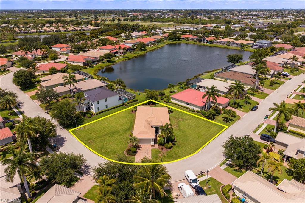 Lakefront living, oversized lot, and resort-style amenities—this is the Florida lifestyle you've been waiting for! Nestled on one of the rare oversized lakefront lots in the highly desirable gated community of Sandoval, this beautifully maintained 3-bedroom plus den home offers the perfect combination of comfort, convenience, and breathtaking water views. With plenty of room to add your dream pool, the possibilities for outdoor living are endless.

Inside, you'll find tile flooring throughout with no carpet, granite countertops, stainless steel appliances, and a spacious open-concept layout designed for both everyday living and entertaining. The split-bedroom floor plan provides privacy and flexibility, while the den offers the perfect space for a home office, media room, or guest retreat.

Recent updates include a new A/C system (2024) and fresh exterior paint (2025), providing peace of mind for years to come. As an added bonus, preventative termite bait stations have been professionally installed around the home's perimeter.

Located near the convenient Trafalgar Gate entrance, this home offers easy access in and out of the community while remaining just a short stroll along Sandoval's miles of beautifully landscaped walking and biking paths to the community's outstanding amenities.

Residents enjoy low HOA fees and an impressive resort-style lifestyle featuring a lagoon-style pool with waterslide, clubhouse and community center, fitness center, shaded playground, basketball court, tennis and pickleball courts, bocce ball, sand volleyball, fishing pier, disc golf, dog parks, numerous community events, and nighttime security. Whether you're seeking an active lifestyle or a peaceful waterfront retreat, this exceptional home offers the best of both worlds.

Priced to sell, this is a rare opportunity to own one of Sandoval's oversized lakefront properties. Come discover why so many choose to call Sandoval home and what it is like to live life on vacation.
