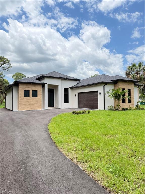 New construction with 3 bed and 3 baths plus an office. Many upgrades with carpentry trim works in the try ceiling, cabinets in closets. Tile to the ceiling in all bathrooms, cabinets to the ceiling, full backsplash, range hood.