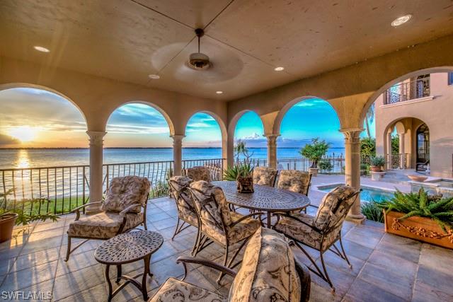 This stunning riverfront estate has been custom built by one of Florida’s Top Premier Luxury Home Builders and was designed by World Renowned WA “Bud” Lawrence, with timeless European design influences from Spain, France, Greece and Italy.  This award winning team has produced an exciting and unique home, built with the highest quality and custom craftsmanship.  From the moment you arrive, you will be captivated by the long range river views and incredible sunsets.  Your new 115’ boat dock on the wide Caloosahatchee River can accommodate up to a 40’ yacht and is just a short ride to the blue waters of the Gulf for world class fishing and leisure.  Features include: Private Guest House, 5 Bedrooms (all En-suites), Den, Seven Bathrooms, Impact Glass, Secret Garden with Koi Pond, Private Elevator, Multiple Fireplaces, Two Laundry Rooms, Tropical Landscaping, Butler’s Pantry, Gourmet Kitchen, Verandah with Fireplace overlooking the River, Breathtaking Sunsets and so much more.  This estate is located in the historic section of McGregor Boulevard and minutes from the Edison Estate and Historic Downtown.