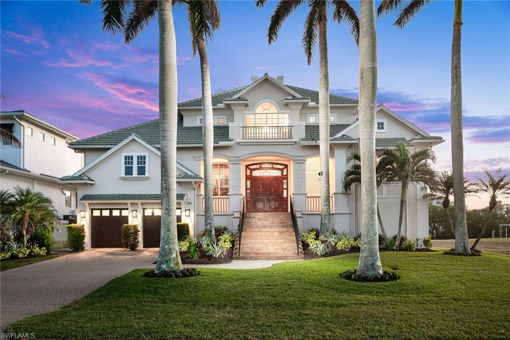 Welcome to waterfront luxury! Enjoy waterfront living without the worry - this home got NO WATER in the living areas or pool area during any storm (elevation certificate available)! HIGH AND DRY! This stunning custom-built home on a coveted southern-facing, cul-de-sac lot offers 4,117 square feet of meticulously maintained living space. Enjoy 4 spacious bedrooms, a versatile den/theater room, and 4 bathrooms, along with separate living/family rooms and a formal dining room. Custom-built and occupied by the only owner, this home has been pristinely cared for and thoughtfully updated along the way. Recent enhancements include a newer roof, modernized kitchen, newer appliances, updated water heaters, pool equipment, and fresh outdoor decking. Unique to this property, the pool and spa are elevated to the main level, allowing for seamless flow from the interior to the outdoor entertainment space - a rare feature and ideal for enjoying the sunset in privacy. The boat dock, replaced in 2022, features a 15,000 pound boat lift to keep your treasured boat out of the water and protected. The expansive lower level boasts a large garage that can accommodate up to 6 cars, plus two air-conditioned flex rooms ready to be tailored to your needs. This is more than a home; it's a lifestyle.