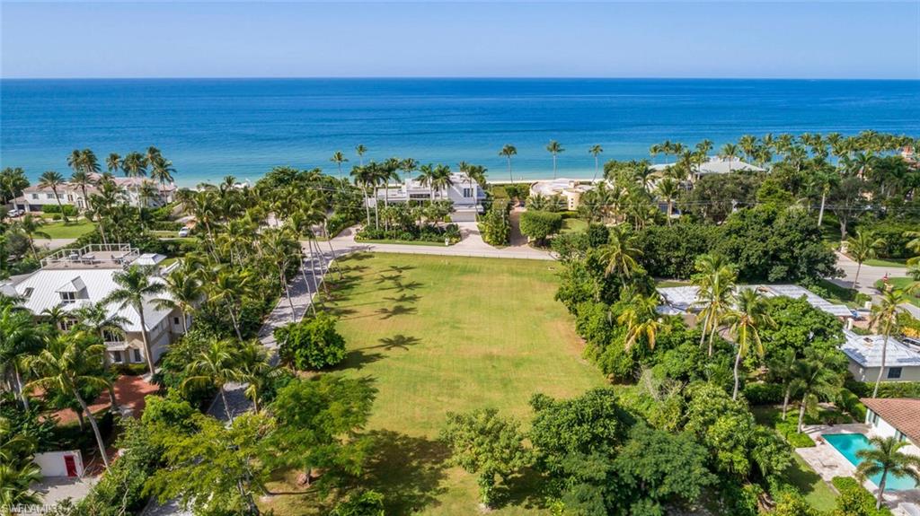 L.2175 -  Big price drop on a wonderful vacant lot! Beach access via easement right across the street from this beautiful .54 acre homesite! Perfect opportunity to build your dream home on this oversized, 23,522 Sq.ft. lot on prestigious Gordon Drive across from the beach. Eligible for associate Port Royal Club membership. See supplements for survey and conceptual drawings by the renowned Kukk Architecture and Design of Naples, depicting an amazing, open concept, luxury home with elevator and four car garage.