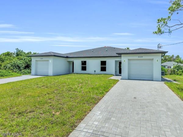 Brand new Contruction Duplex in the growing area of Lehigh Acres. This newly built property offers two identical units, each featuring 3 bedrooms, 2 bathrooms, modern open floor plans, quartz countertops, white shaker cabinetry, impact windows and doors. Separate utility connections provide convenience and flexibility for both investors and owner-occupants. Excellent opportunity to generate rental income while building long term equity.
