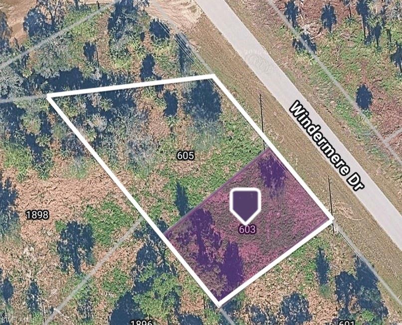 Prime side by side vacant lots in a fast-developing pocket of North Lehigh Acres — a clean, buildable canvas for your next project or a smart addition to your land bank. Whether you're a builder ready to break ground or a buy-and-hold investor positioning ahead of Lehigh's continued growth, this parcel checks the boxes: no HOA, no time-to-build restrictions, and surrounded by new construction and established homes. Perfect buy for a builder or long term land investor