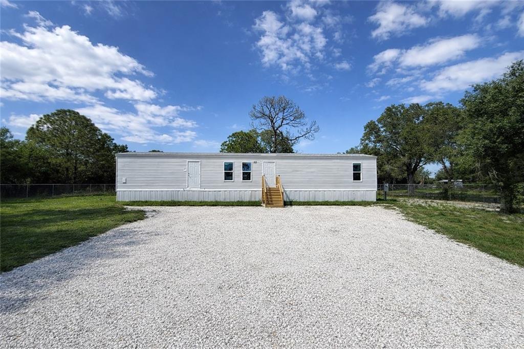 One or more photo(s) has been virtually staged, AI generated or rendered.  Newly available!!. This 2026 mobile home sits on a generous 1.10-acre lot in the peaceful Montura Ranches community, offering space, privacy, and flexibility.

Featuring 3 bedrooms and 2 bathrooms, this home is designed for comfortable living with a functional layout and plenty of room to make it your own. Recently installed and ready for occupancy, the property includes electricity, water, septic, and well—making it a true move-in ready opportunity.

Enjoy the freedom of no HOA restrictions—bring your RVs, boats, and animals with ease. Located on a paved road, providing convenient access while still maintaining a quiet, rural setting.

Whether you’re looking for a primary residence, a weekend retreat, or an investment property, this home offers excellent potential.