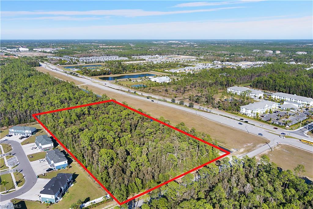 Prime development opportunity in rapidly growing Naples on 5 acres of RMF-6 zoned land with exceptional potential for expansion to 15 total acres making this an extraordinary multifamily residential site in one of Southwest Florida's most sought after markets. The north 5 acres is currently zoned for church or school. The property offers immediate development advantages with public water and sewer utilities already installed along Santa Barbara Boulevard by Collier County eliminating the substantial infrastructure costs that typically burden development projects and accelerating your timeline to groundbreaking. RMF-6 zoning permits single-family homes, duplexes, and multifamily residences up to 6 units per acre allowing for approximately 30 units on the current 5 acres or up to 90 units if expanded to the full 15-acre assemblage providing remarkable flexibility for developers seeking to maximize density while maintaining the low profile residential character that defines Naples living. The Santa Barbara Boulevard corridor has emerged as a critical north-south artery connecting residential communities to Naples' world-renowned amenities with direct access to I-75 just 5 minutes away via Golden Gate Parkway interchange enabling seamless regional connectivity for future residents commuting to Fort Myers or traveling to Southwest Florida International Airport. Location advantages include proximity to Golden Gate Community Park and Aquatic Facility featuring fitness centers, tennis courts, swimming pools, and water slides just minutes away, while Veterans Community Park offers additional recreation with lakefront beaches, kayaking, and sports facilities. The surrounding area benefits from established retail infrastructure including Publix, ALDI, Walmart, and CVS creating the convenience that today's renters and homebuyers demand. Downtown Naples with its legendary Fifth Avenue South shopping, white-sand Gulf beaches, and upscale dining sits approximately 15 minutes away offering future residents the perfect balance between urban amenities and peaceful residential living. Multiple public and private schools serve the Golden Gate area while Florida Gulf Coast University and Hodges University provide higher education within reasonable commuting distance. The property's position along Santa Barbara Boulevard places it in the path of Naples' continued northward expansion as the city grows to accommodate the thousands of new residents relocating to Southwest Florida annually seeking the region's exceptional climate, outdoor recreation, and quality of life. With utilities in place, favorable zoning, expansion potential, and a location that delivers both convenience and desirability, this development site represents a rare opportunity to create multifamily housing in a market with sustained demand, limited available land, and strong fundamentals supporting long-term appreciation and income generation.