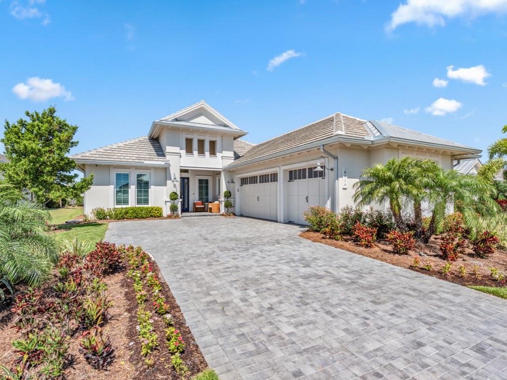 Dazzling plush and polished Stock Homes Mayfield model is move in ready. Professionally decorated 4 bedroom 3.5 bath residence has custom modern touches inside and out. Oversized great room & kitchen w/10 ft island opens to impressive resort style outdoor living and entertaining area,  kitchen, chef’s grill, TV, & heated pool/spa with western exposure. Generac Generator and Storm Smart screens protect against all elements.  Gorgeous master retreat gives a serene sense of calm & relaxation, additional bedrooms provide stylish spaces for guests. A captivating dining room shimmers at sunset.  This 3300+ sq ft. home includes, high end light fixtures, upgraded bathroom fixtures, custom window treatments, plantation shutters, designer wall coverings, custom closets, new water filtration system, Sonos speakers , security cameras, gas cooktop, custom tiled outdoor kitchen, picture screen pool cage, cabana style Sunbrella lanai sheers and air conditioned garage.  Located less than five miles from the beach, The Isles of Collier Preserve is a gated community with amenities including, pickle ball, tennis, kayaking, fitness center, lap and resort pools, bar and grill and over 8 miles of walking trails.  The truly magnificent Naples Botanical Gardens are just 5 minutes away. New access road via Bayshore Drive leads you downtown through Naples coolest new neighborhood.