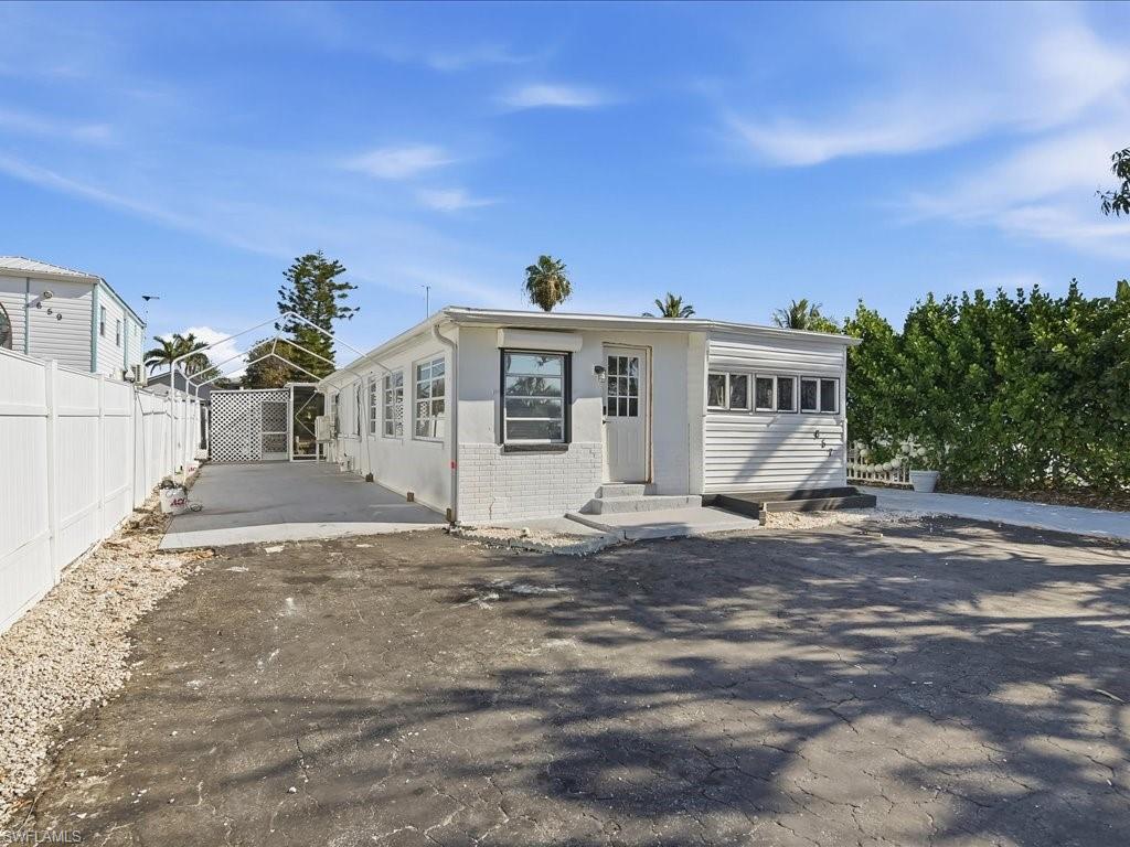 DIRECT GULF ACCESS minutes to WORLD CLASS FISHING of the pristine 10,000 islands and access to the many private beaches along the coast or become a member to the EXCLUSIVE PRIVATE residents beach!! This home is an ideal INVESTMENT property or a great OPPORTUNITY for boaters to experience living on the water at an AFFORDABLE price with no mandatory homeowners association, no community district development fees, no city taxes and seller offering financing. Make this your way to achieving the Florida boaters dream lifestyle. Enjoy the highly sought after location of GOODLAND a historic fishing village with its laid back atmosphere. This golf cart community offers an OLD FLORIDA feel and is in close proximity to several restaurants and bars, two marinas, a small convenient post office, a fish market, a county boat launch, a park with a playground and a museum. This slice of PARADISE is waiting for you with endless possibilities to add your own personal touch and charm or keep the current tenants for an instant investment property!!!