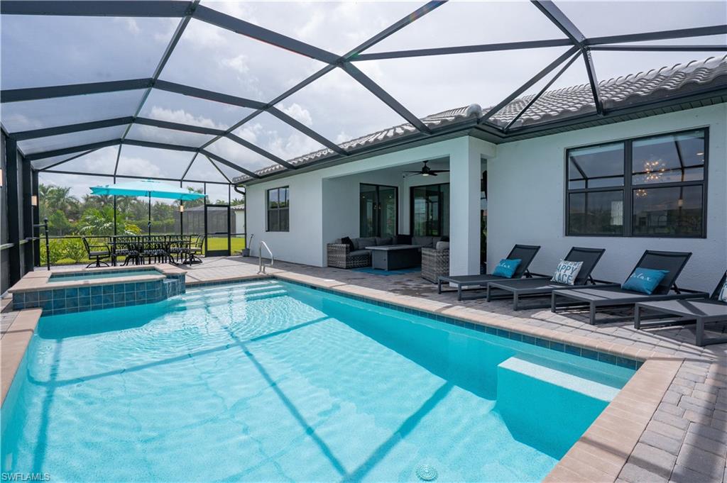 Move-in-Ready! Stunning pool home on lake with 3 bedrooms, den/office, 3 full baths and 3 car garage. This wow factor home sits on an oversized lot with newly upgraded landscaping and is located on a cul-de-sac. Very desirable Lennar Summerville floor plan with spacious great room with tray ceiling, electric fireplace with custom accent wall, open kitchen with eat-in dining room. Kitchen features stainless appliances, granite island and counter tops, custom backsplash, upper and under cabinet lighting & kickboard and walk-in pantry. Master suite features private lanai access, walk-in closets, spacious master bath with large walk-in shower, dual vanities with granite tops and water closet. Den/office with French doors, second bedroom and guest suite with private bath. This lovely home also features tile through-out, crown molding and custom Hunter Douglas Blinds. Inside laundry room with laundry tub and spacious 3 car garage for vehicles and toys! Plenty of room for entertaining and enjoying lake views on the extended lanai with custom lighting, sparkling saltwater pool and spa. Arborwood Preserve offers resort-style amenities. Schedule your private showing today!