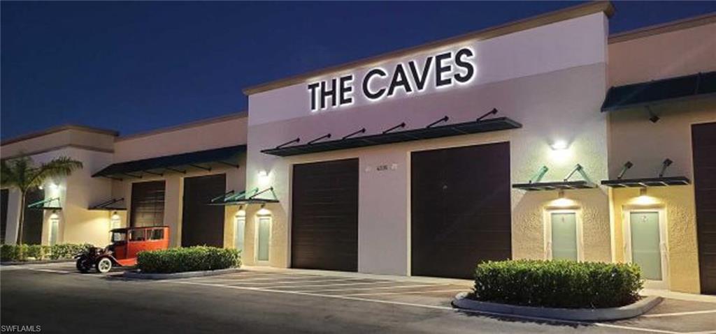 Discover the ultimate solution for secure, luxury storage at the prestigious Caves of Cape Coral. This gated storage condo is designed for discerning owners seeking a high-end space for boats, RVs, exotic vehicles, classic cars, recreational equipment, and prized collectibles. Featuring soaring ceilings and a large roll-up door 12ft wide  x 14 ft door tall, the unit offers exceptional accessibility and flexibility for a variety of storage needs. Inside, you'll find premium features throughout, including a private ADA-compliant bathroom, private HVAC system, utility sink, man door entry, 200 AMP electrical panel, and a 50 AMP outlet — providing both convenience and functionality. Whether storing luxury vehicles, marine equipment, or hobby collections, this unit is built to accommodate it all. The community itself delivers an unmatched ownership experience with fully gated and secure access, security cameras with app monitoring, a dedicated vehicle wash bay with marine flush station, and an owner’s lounge complete with BBQ area and fire pit — creating the perfect blend of practicality, security, and upscale amenities. Rarely available and highly sought after, this luxury storage condo offers the ideal home for your investments and adventures. Note you can’t live in or run a business out of the Caves of Cape Coral. Schedule your private showing today and experience firsthand the security, convenience, and luxury that make this exceptional storage condo truly one of a kind.