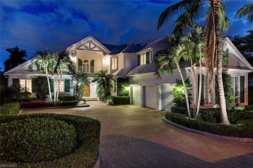 1099 Spyglass is the magical merging of inspiration and architecture.  Every detail was carefully selected and quality crafted.  The expansive gathering room, bathed in Florida's famous sunlight, with sliding doors to the waterfront veranda is the dramatic focal point of the main level.  Accompanied by adjoining master suite with sitting area, 2nd and 3rd bedrooms, den, formal dining room, tremendous chef's kitchen and family room with fireplace complete this proper water view of Runaway Bay.  Second floor features 3 bedrooms, 2 baths  and its own family room perfect for visiting family and guests.  The pool and spa are enhanced by two levels of terrace.  Upper level features summer kitchen and dining while lower level accommodates poolside lounging and private boat dock.  Large 3-car garage with additional walk-in storage closet for bikes.  Eligible for Port Royal Club membership.