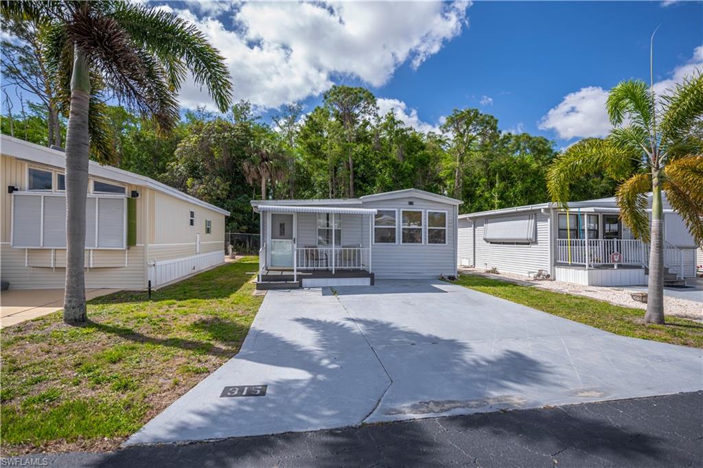 INVESTOR OR HANDYMAN SPECIAL located in desirable Fountain View RV Resort where you OWN YOUR LAND! This 1 bedroom, 2 bath property offers approximately 728 sq ft of living area with vaulted ceilings and is being SOLD AS-IS, CASH BUYERS ONLY. The home is currently turnkey; however, it requires updates and repairs, or may be removed to create a prime RV site suitable for a fifth wheel, tow-behind trailer, or motorhome. Positioned on a premium exterior lot backing to green space, this property offers added privacy and a desirable setting. NOT LOCATED IN A SPECIAL FLOOD HAZARD AREA (SFHA).  The clubhouse is just a short walk away, and the low HOA fee of $264.50/month includes cable, water, sewer, trash, lawn care, and professional management. Residents enjoy a vibrant, active lifestyle with amenities including a clubhouse, community pool and spa, bocce, shuffleboard, tennis, pickleball, volleyball, basketball, community room, and common laundry facilities, along with optional RV and boat storage.  Ideally situated between Downtown Punta Gorda and Downtown Fort Myers, and just minutes to shopping, dining, medical facilities, golf, and Gulf beaches. Excellent opportunity for investment, seasonal use, or redevelopment within a well-maintained 55+ community.