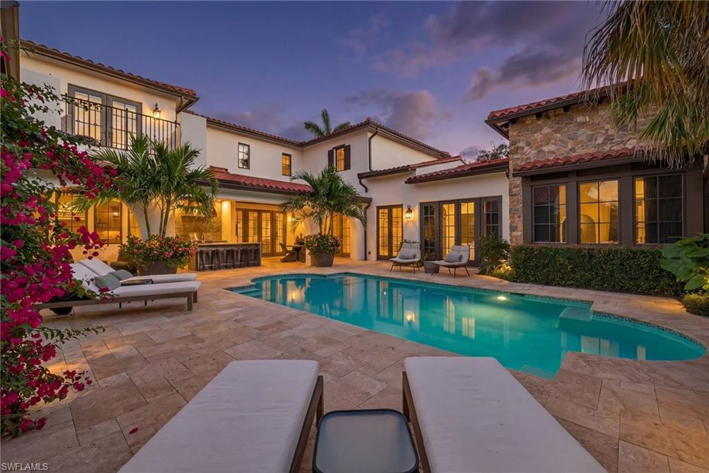 Considered. Designed. Intentional. Tucked within the gates of Mediterra, this extraordinary Mediterranean estate is a masterclass in elevated design, privacy, and modern luxury. Offering four bedrooms plus a den, four full baths, and one half bath, the residence sits on an oversized, impeccably curated lot that feels worlds away from a neighborhood—more like your own secluded botanical retreat.

Since the purchase, the seller has invested over $3 million in thoughtful, high-level improvements, including $1 million in landscaping alone. Mature trees, lush florals, and layered plantings envelop the property, creating a sense of serenity and scale rarely found. The exterior has been extensively reimagined: a new roof and gutters, replaced lanai ceiling woodwork, extended fencing for enhanced privacy and usability, and refined architectural details throughout.

Outdoor living is exceptional. The pool and spa have been fully resurfaced and redesigned with all-new equipment, complemented by new pavers and a brand-new outdoor kitchen, transforming the backyard into a resort-style oasis ideal for both intimate evenings and elegant entertaining.

Inside, the home is equally refined. A custom-designed front door, flooded with natural light, sets the tone upon entry. The garage has been completely reimagined to house and showcase luxury automobiles properly. Every bathroom has been intentionally curated using the finest materials, including rare and exquisite marble, while the interior has been freshly repainted and enhanced with new flooring in select areas. All HVAC systems are updated, ensuring comfort with modern efficiency.

This is a rare opportunity to own a meticulously upgraded, design-forward estate where no detail has been overlooked—an exceptional offering for the most discerning buyer seeking privacy, artistry, and enduring value in one of Naples’ most coveted communities.

Mediterra pairs resort-level amenities with a true private-club lifestyle—two Tom Fazio championship golf courses, an active racquet and social scene with tennis, pickleball and bocce, a well-equipped fitness center, and miles of scenic trails for biking or morning runs. And when you want the Gulf, the Mediterra Beach Club delivers: a beautifully appointed, two-story beachfront retreat with dining and bar service indoors or out, a heated pool and sun deck, and full cabana-style beach service for chairs, umbrellas, and refreshments—your own effortless escape on the sand.
