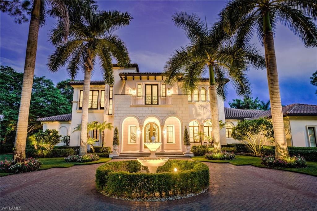 This exceptional Grey Oaks home has recently experienced a full renovation to exacting standards. Featuring lake and golf course views, the home is a visual and entertainment tour-de-force thanks to masterful indoor/outdoor living areas. With southern exposure for the nearly one-acre lot (almost unheard of in Grey Oaks) with exceptional landscaping, you’re afforded a luxurious expanse, which includes two swimming pools and a spa offering legendary Naples sunsets. Inside, the great room notes a beautiful stone fireplace, French doors and marble flooring highlighted by a new Savant lighting system. The chef-grade kitchen shines with gourmet appliances, custom cabinetry, a butler’s pantry, center island, traditional pantry, two refrigerators, and two dishwashers. In addition, the residence includes 5 Bedrooms, Study and Loft as well as a custom-designed wine storage, two stone fireplaces, a summer kitchen with a gas grill, a wet bar off the living room, custom elevator, and 65kw full-house generator. There are even four attached air-conditioned garages. This is the gem of Grey Oaks.