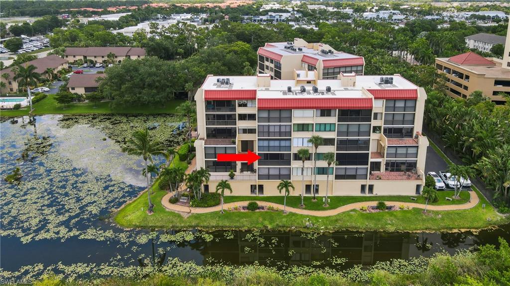 Welcome to Ashland II, where peaceful lake views, abundant wildlife, and an unbeatable Fort Myers location come together. This well-maintained 2-bedroom + den, 2-bath condominium offers 1,339 square feet of comfortable living space overlooking the scenic Lakes Park Preserve, creating a tranquil backdrop to enjoy from your private screened lanai.

Inside, you'll find brand-new carpet throughout the main living areas and both bedrooms, while the versatile den/office features luxury vinyl plank flooring, making it the perfect space for working from home, hobbies, or additional guest accommodations. The spacious kitchen and bathrooms remain in their original condition, offering an excellent opportunity to update and customize the home to match your personal style. Recent improvements include a brand-new dishwasher (July 2026), with a new refrigerator being installed this week. 

Additional features include an indoor laundry room complete with a utility sink, under-building assigned parking, and a private storage shed for added convenience. Ashland II is a secure building with keypad entry and consists of only 20 residences, providing a more private, boutique-style living experience. As an added benefit, the building's elevator replacement is scheduled for completion in early July 2026, offering peace of mind for years to come.

Residents enjoy outstanding community amenities including a lakeside pool, tennis courts, fishing dock, BBQ area, and direct views of the beautiful Lakes Park Preserve. Ideally located in the heart of Fort Myers, you'll be just minutes from shopping, dining, entertainment, and Southwest Florida's world-famous beaches.

Whether you're searching for a seasonal retreat, full-time residence, or investment opportunity, this condo offers exceptional value and endless potential. Schedule your private showing today!